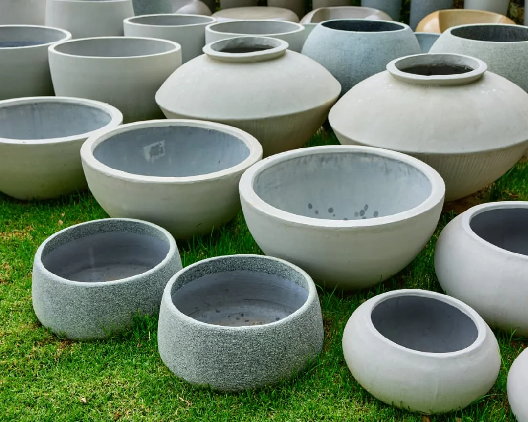Rounded planters arranged in the yard